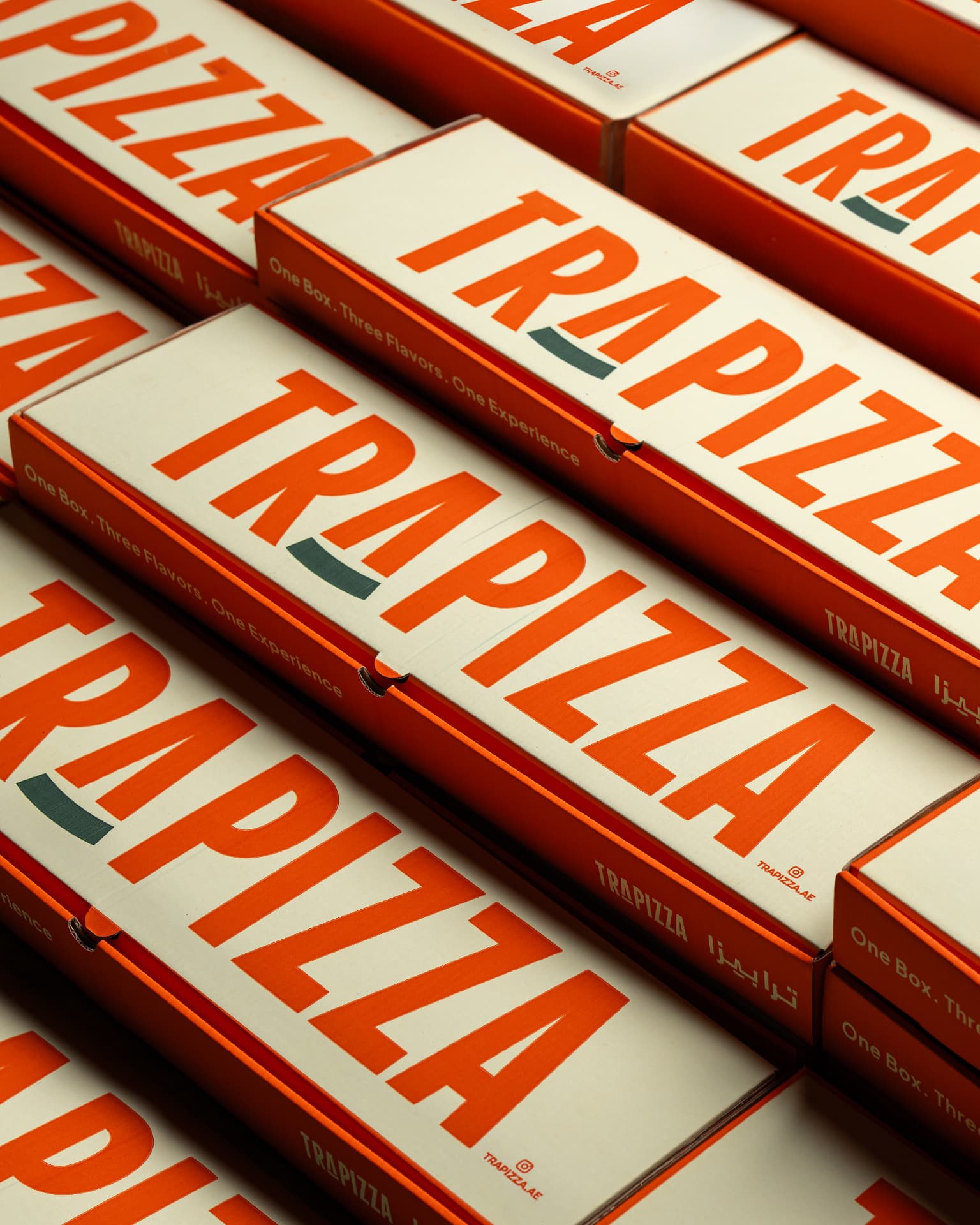 Trapizza boxes stacked in rows