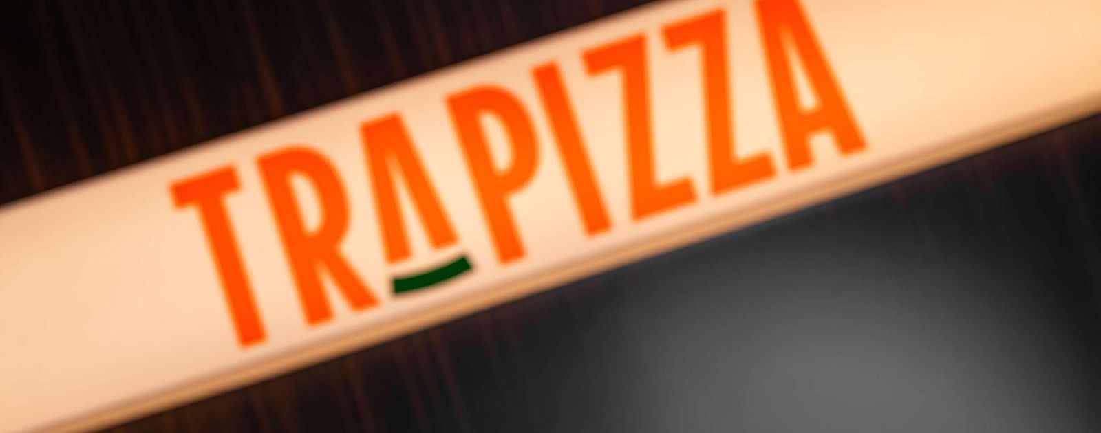 Illuminated Trapizza sign